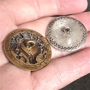 Two buttons of birds doing things.