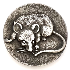 Detailed white metal button of a rat.