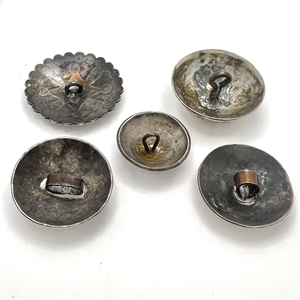 Five modern Native American silver buttons with assorted images.