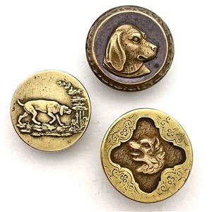 Three sporting buttons of dogs and a fox (?).