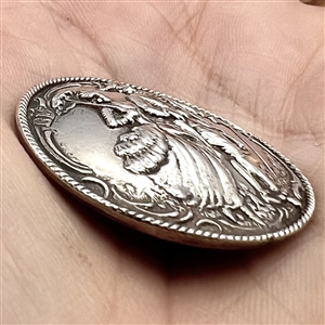 Hallmarked silver button of man and woman walking with umbrella and cane. 