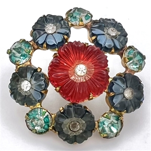 Pretty jewel button of multicolored flowers and pastes.
