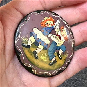 Russian lacquer button of dancing “Raggedy Ann and Andy.