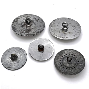 Four Steel buttons and One white metal button. 