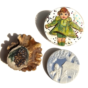 Three fun studio buttons.