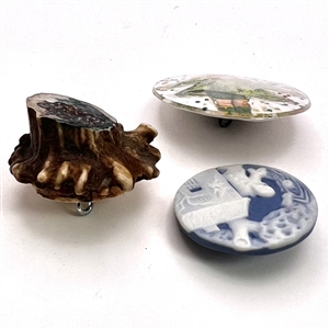 Three fun studio buttons.