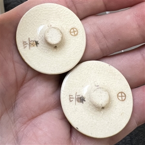 Two satsuma buttons of Japanese women.