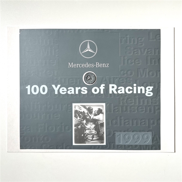 Cover of from a 1999 promo booklet with a Mercedes-Benz button.