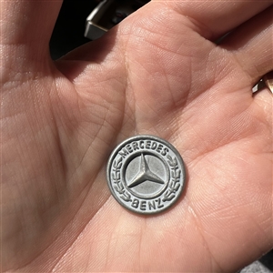 Cover of from a 1999 promo booklet with a Mercedes-Benz button.