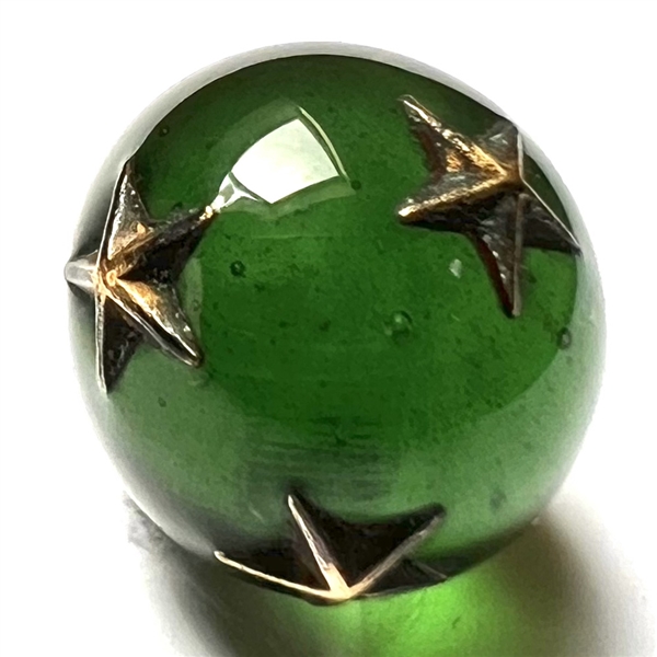 RARE green glass ball button with impression inlay metal stars.