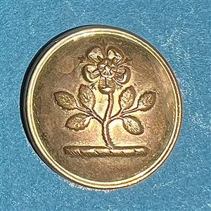 Four livery buttons of hands holding things and plant life.