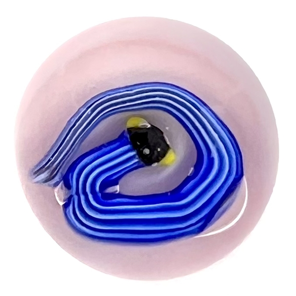 Studio glass paperweight button of a snake.