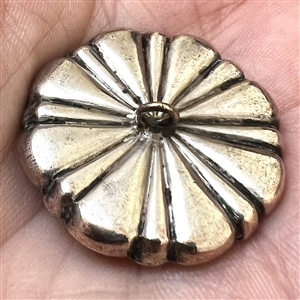 A 19th c. Georgian jewel button with amethyst glass and pastes.
