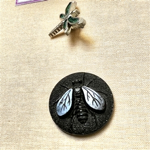 Card of nineteen insect buttons. 