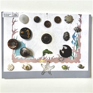 Card of eighteen buttons of animals & items from the sea. 