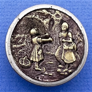 Brass button of “Crossing the stream.