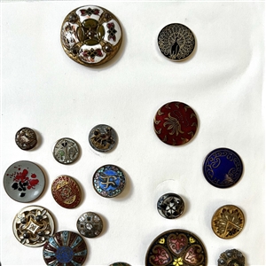 Card of forty four mostly enamel buttons.