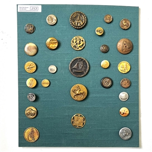 Card of twenty eight mostly transportation buttons.