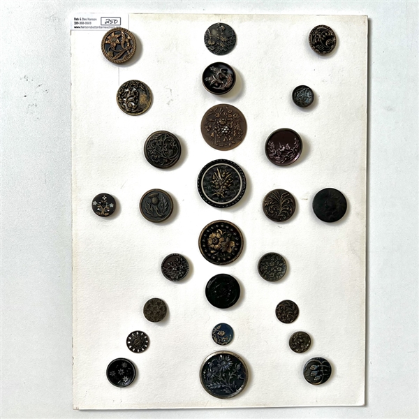 Card of twenty six buttons of plant life.