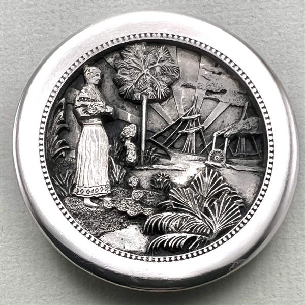 Huge Battersea pewter button of Seminole woman spreading hibiscus flowers 75th anniversary NBS Show favor button 2013.
