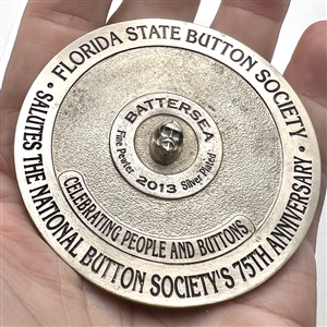 Huge Battersea pewter button of Seminole woman spreading hibiscus flowers 75th anniversary NBS Show favor button 2013.