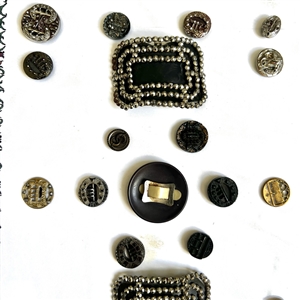 Two cards of buttons and buckles, two of which are 19th c. shoe buckles.