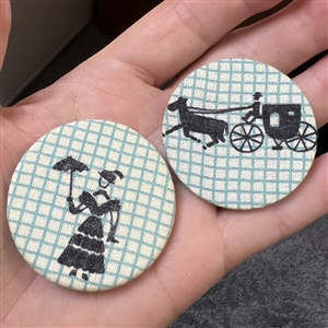 Two 1940's fabric studio buttons by Henrietta Harding from Maine.