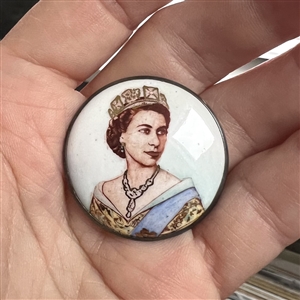 Motiwala enamel button of Queen Elizabeth II and commemorative card with tassel.