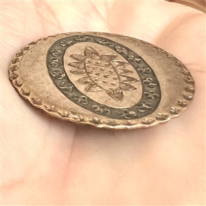 An 18th c. Copper colonial button with heavily chased intaglio design. 