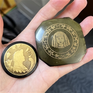 Two Vintage celluloid buttons with Egyptian theme.