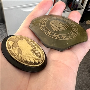 Two Vintage celluloid buttons with Egyptian theme.