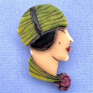 Realistic plastic button of a “Flapper head.