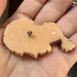 Realistic plastic button of a “Flapper head.