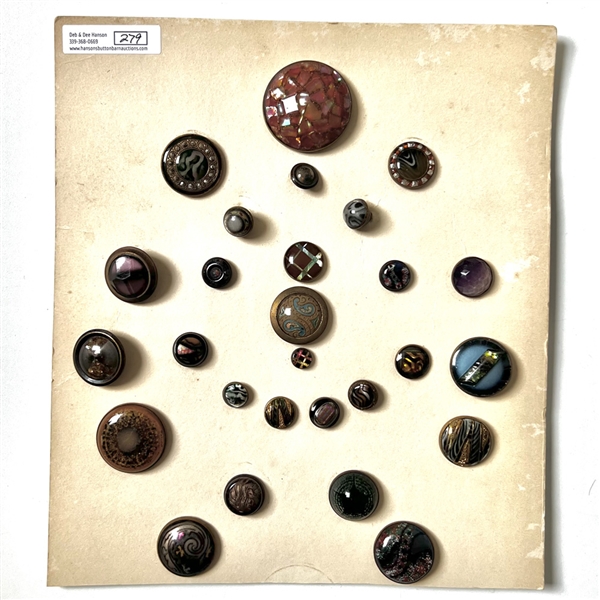 Card of twenty seven glass in metal buttons. 