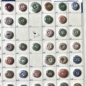 Card of one hundred & thirty seven small china calico buttons. 