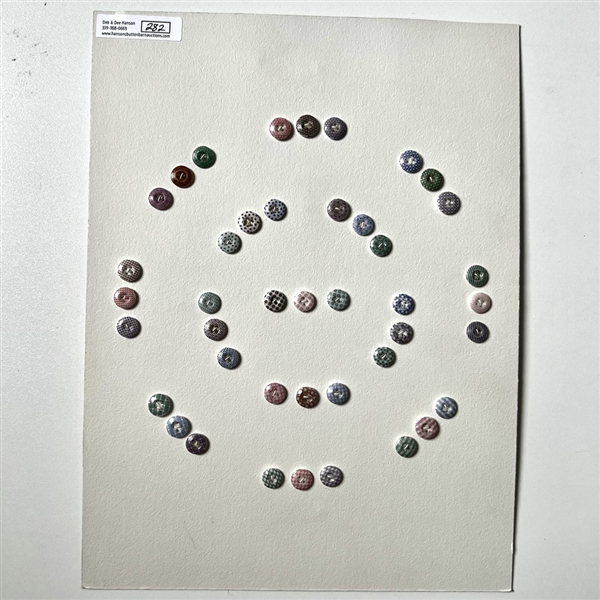 Card of forty two small china calico buttons. 