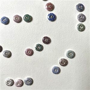 Card of forty two small china calico buttons. 