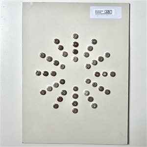 Card of forty two small china calico buttons in brown. 