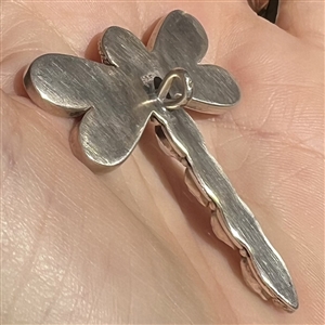 Silver button of a realistic dragonfly with seed pearls.