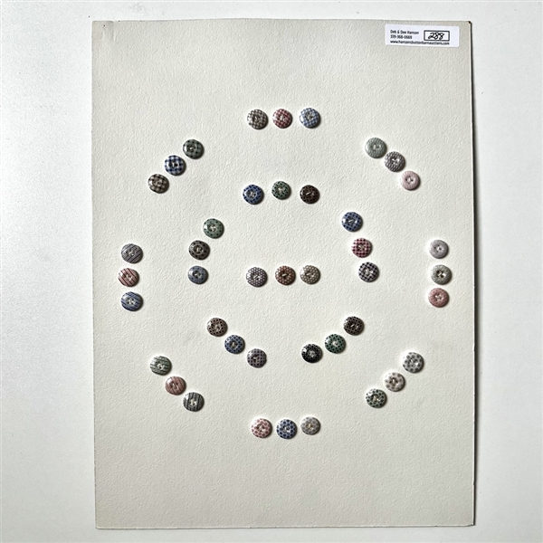 Card of forty two small china calico buttons.