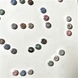 Card of forty two small china calico buttons.