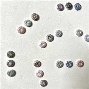 Card of forty two small china calico buttons.