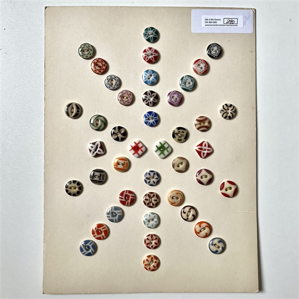 Card of forty two small - medium china stencil buttons.