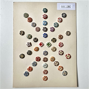 Card of forty two small - medium china stencil buttons.