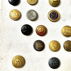 Card of thirty uniform buttons. 