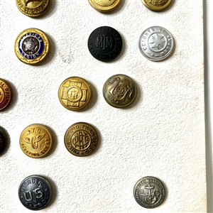 Card of thirty uniform buttons. 