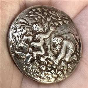 Very early hallmarked silver button of children picking apples.