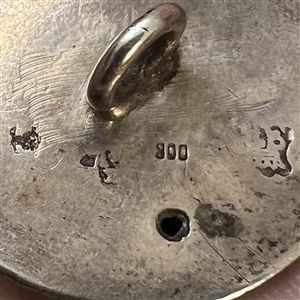 Very early hallmarked silver button of children picking apples.