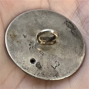 Very early hallmarked silver button of children picking apples.