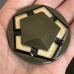 Extra large Vintage celluloid glow button with pentagon.